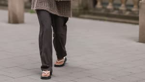 Fraut rägt Flip-Flops