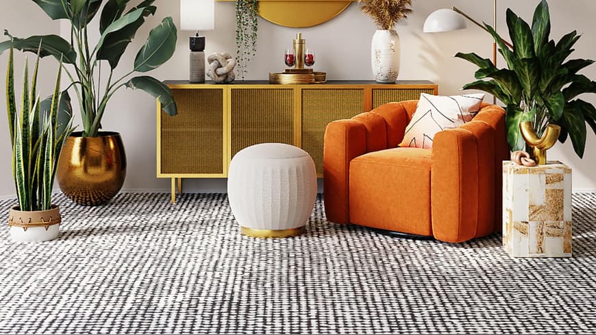 Wohnzimmer orangener Sessel und Kommode