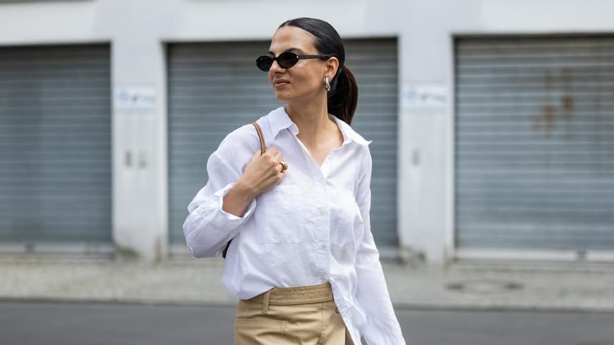 Frau mit weißer Bluse