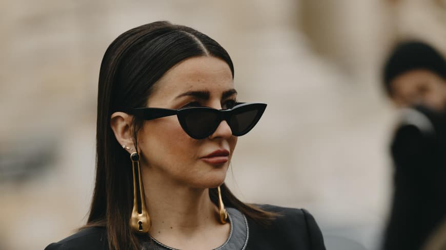Frau mit schwarzer Cat Eye Sonnenbrille