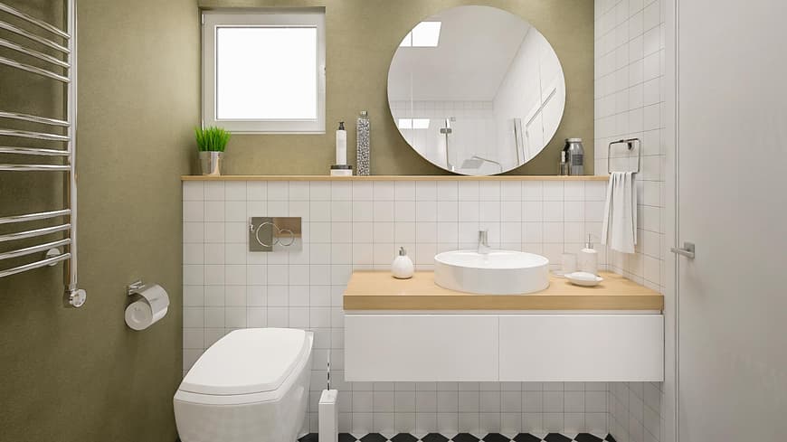 Kleines Badezimmer mit Toilette und Waschbecken