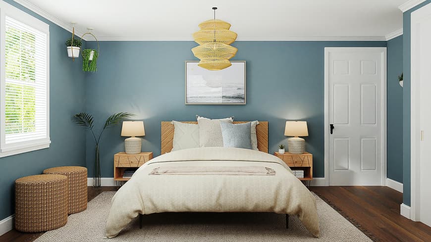 Schlafzimmer mit blauer Wandfarbe und Naturtönen