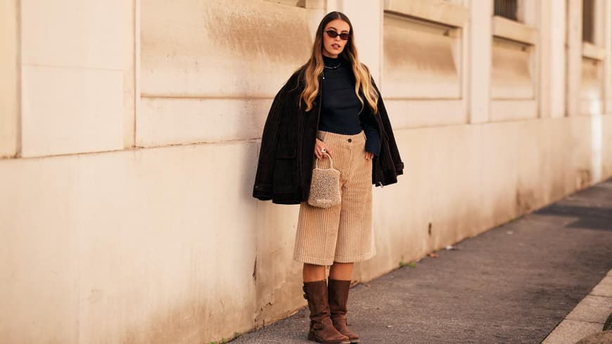 Shorts mit Stiefeln gestylt