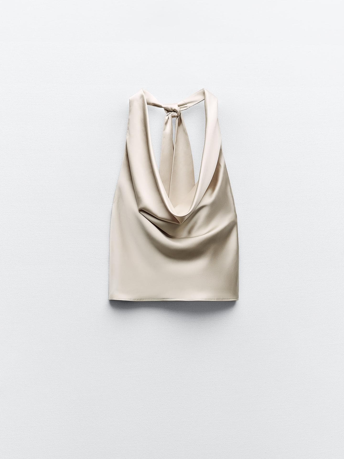 Neckholder-Oberteil mit Schleifendetail. Ärmellos. Rückenfrei. Verdeckter Nahtreißverschluss gold Zara