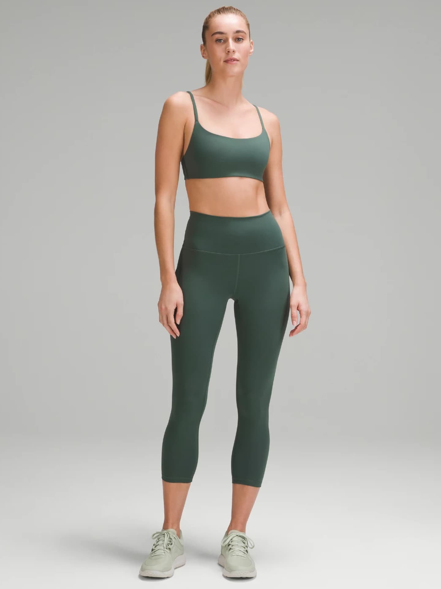 Wunder Train Crop mit hohem Bund und Taschen LuluLemon dunkelgrün