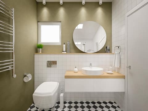 Kleines Badezimmer mit Toilette und Waschbecken