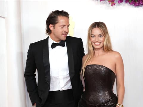 Margot Robbie und Tom Ackerley